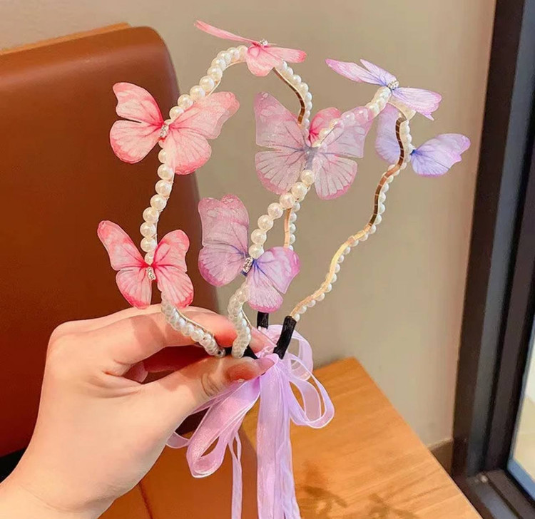تل پروانه ای مرواریدی دنباله دار کد ۲۳۳۱